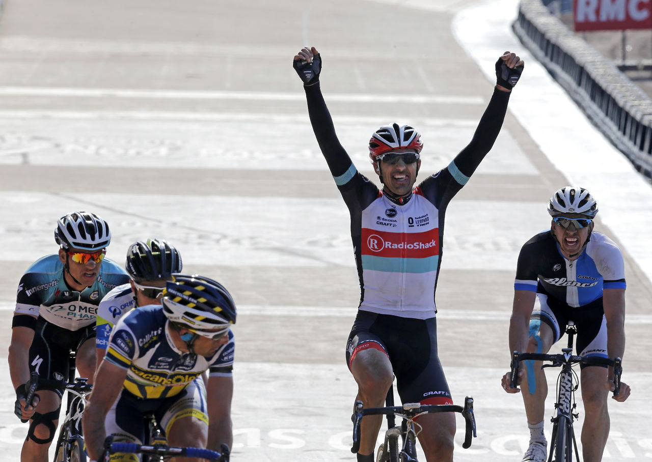 RadioSchack Leopard rider Switzerland's Cancellara celebrates as he crosses the finish line to win the 111th Paris-Roubaix cycling race in Roubaix