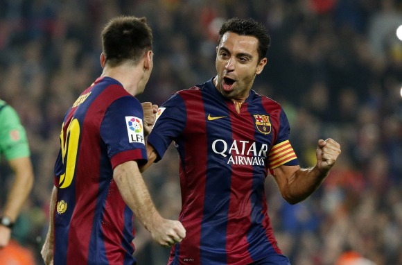 Xavi-celebra-Messi-2015-Reuters